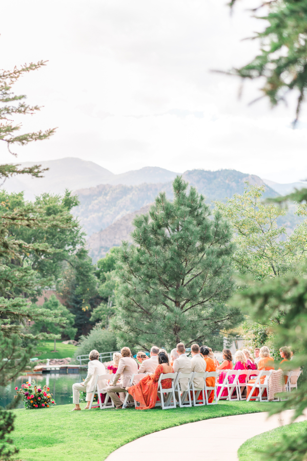 A wedding cermeony awaits by the water of the broadmoor hotel wedding venue