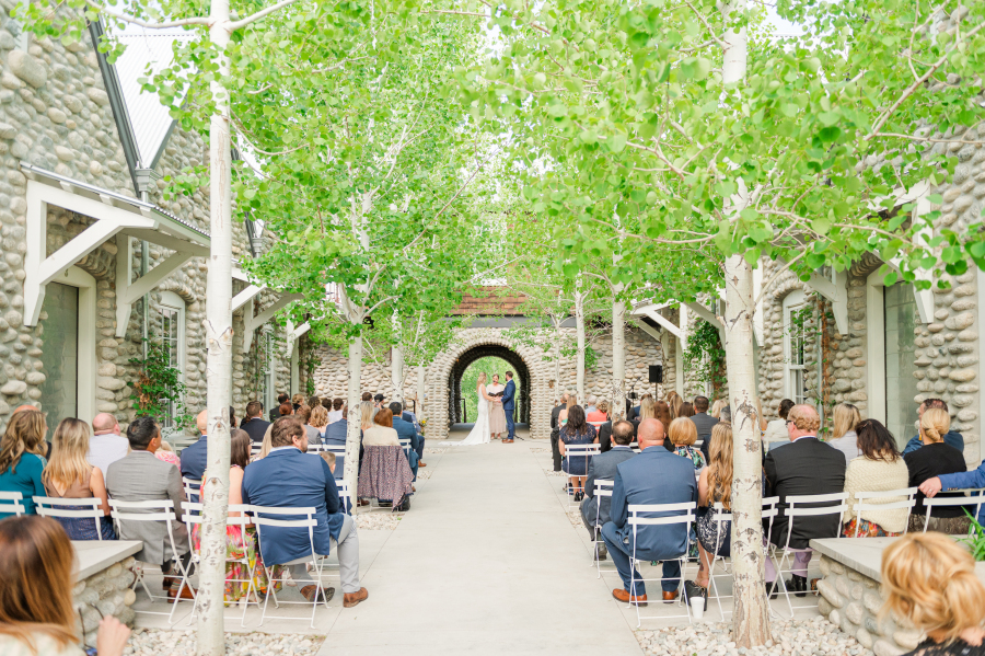A look down the aisle of an outdoor surf hotel wedding ceremony in progress